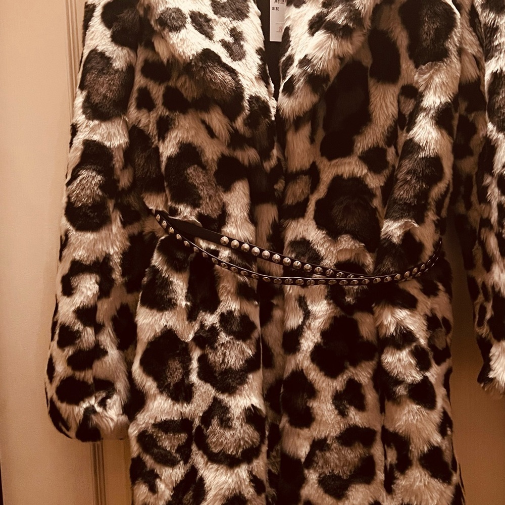 Michael Kors beauty coat in size med with a beautiful cross over belt.